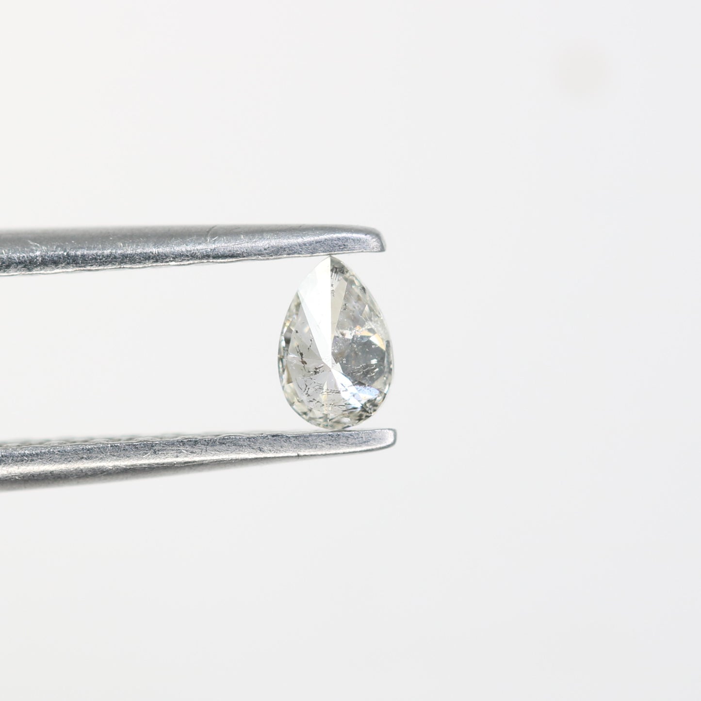 0.15 CT Salt and Pepper Pear Shape Diamond – Perfect for Engagement Rings and Custom Jewelry - JayKrishna Diamond