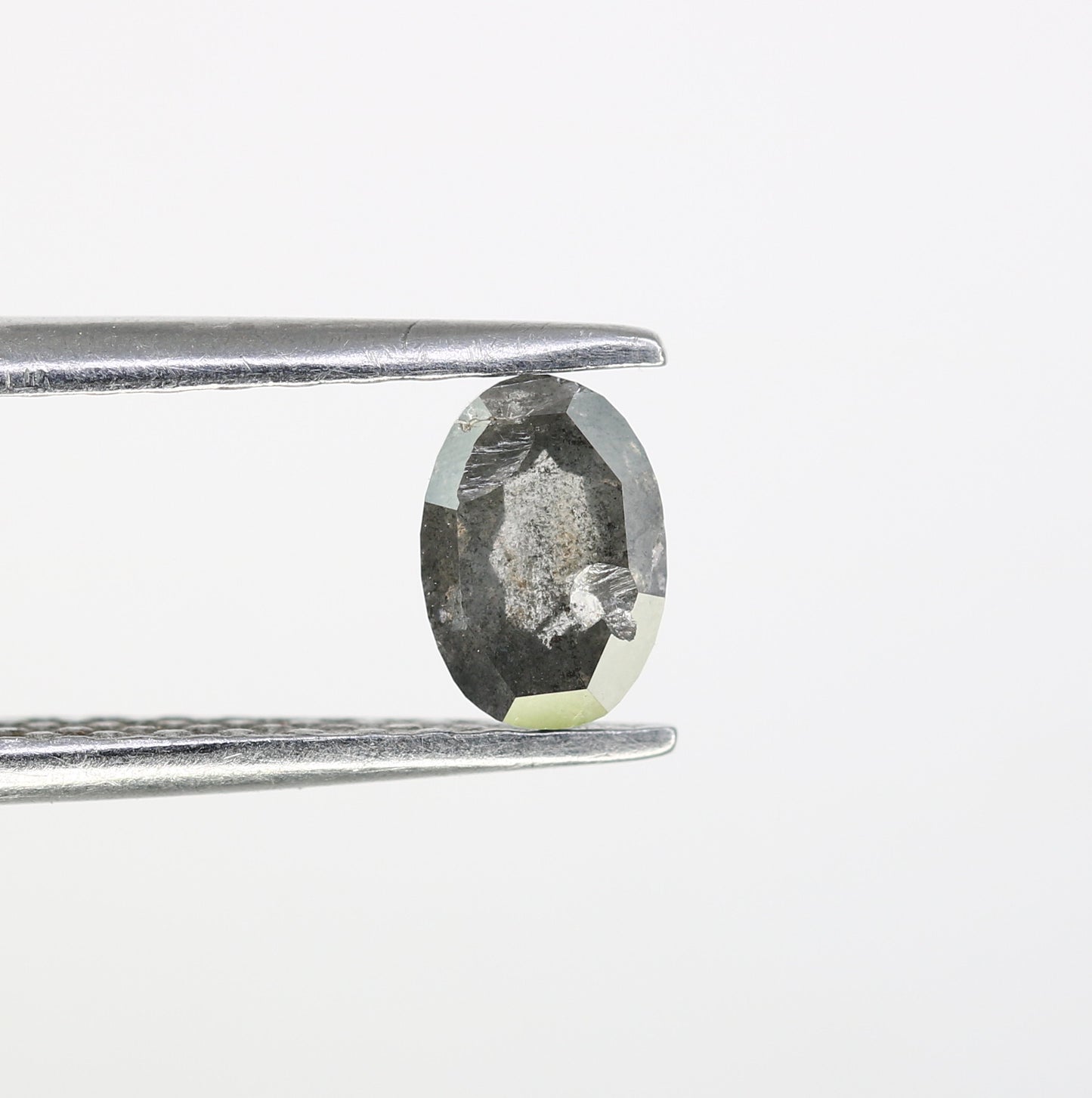 0.54 CT 5.80 MM Oval Shape Salt And Pepper Diamond