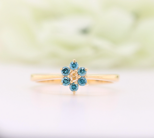 The Radiant Allure of a Yellow Oval Cut Side Blue Round Brilliant Cut 14K