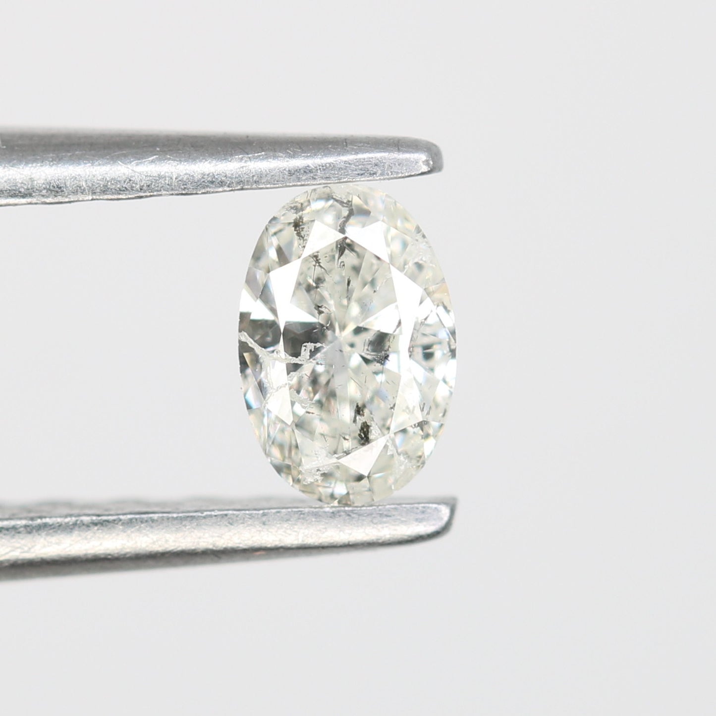 0.22 CT Salt and Pepper Oval Shape Natural Diamond – Ideal for Engagement Rings - JayKrishna Diamond