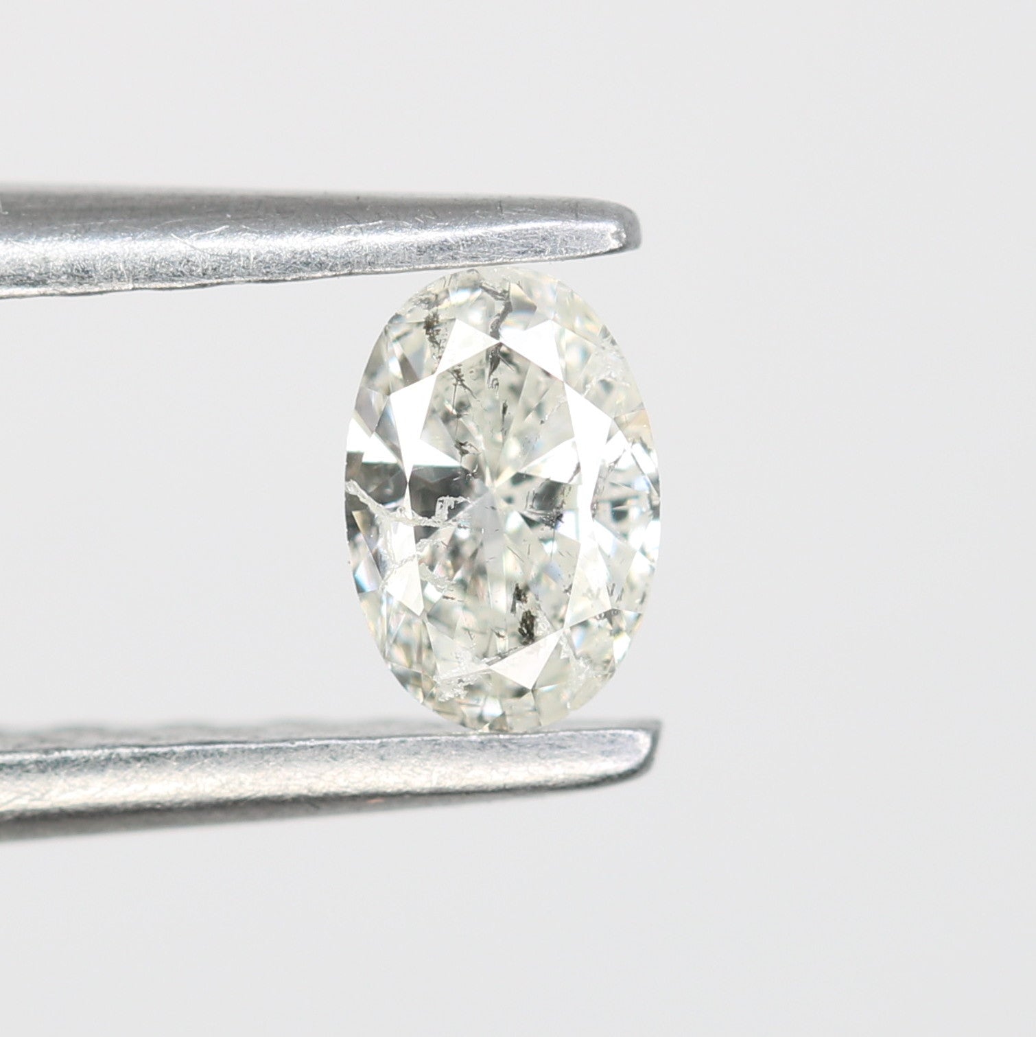 0.22 CT Salt and Pepper Oval Shape Natural Diamond – Ideal for Engagement Rings - JayKrishna Diamond