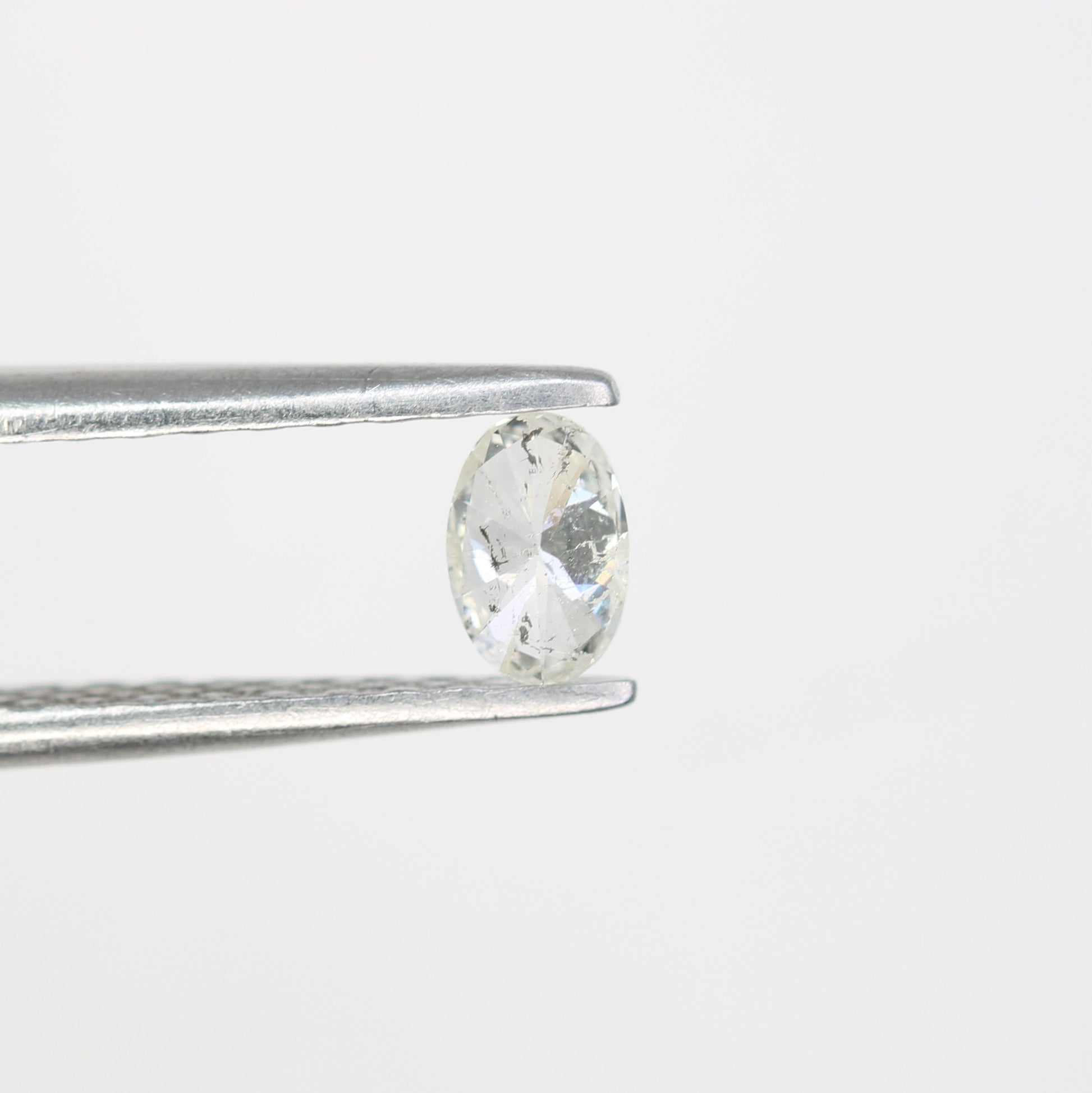 0.22 CT Salt and Pepper Oval Shape Natural Diamond – Ideal for Engagement Rings - JayKrishna Diamond