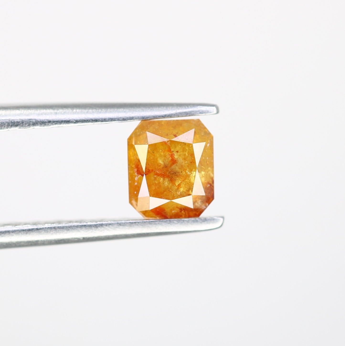 0.64 CT Emerald Shape Peach Diamond For Engagement Ring