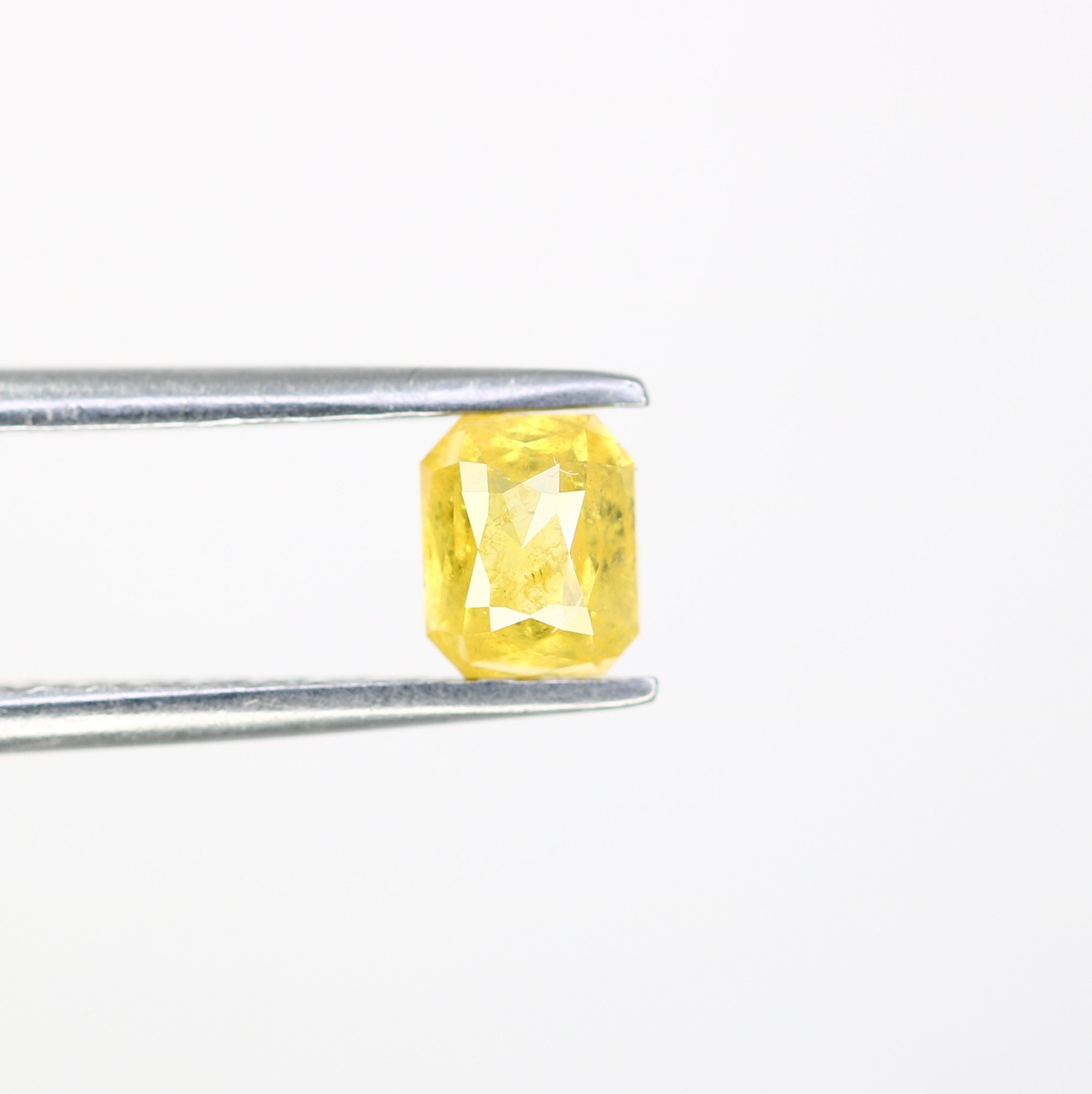 0.58 CT Yellow Natural Emerald Shape Diamond For Engagement Ring