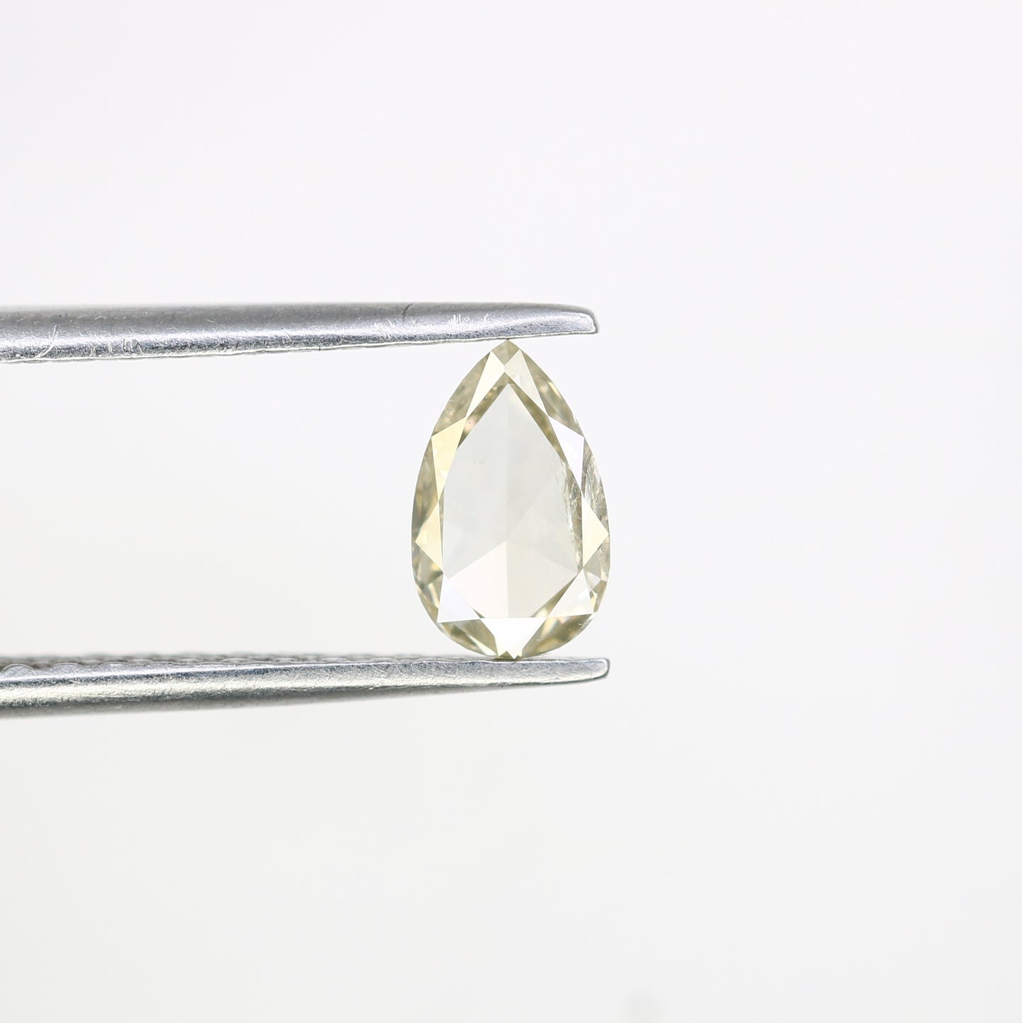 0.57 Fancy Light Yellow Loose Pear Shape Diamond For Galaxy Ring