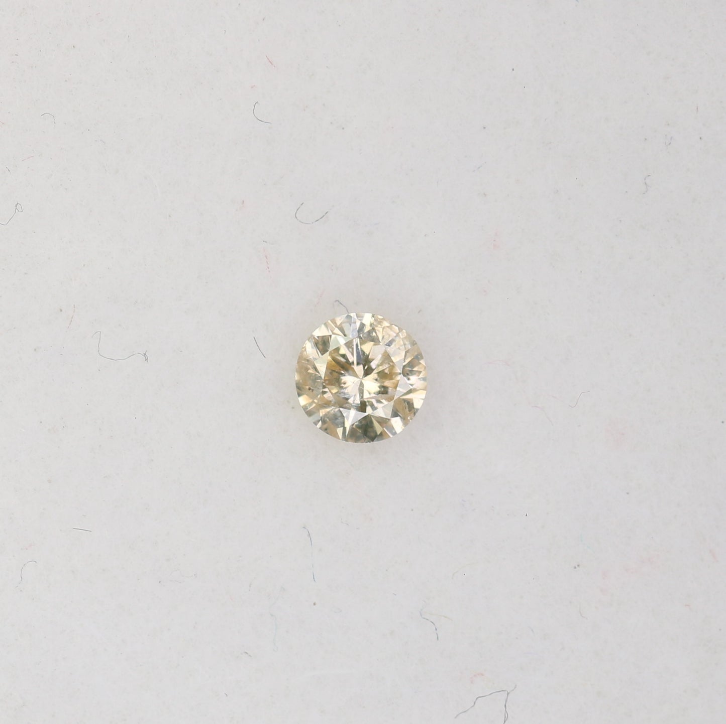 0.09 CT Light Yellow Round Brilliant Cut Diamond For Engagement Ring